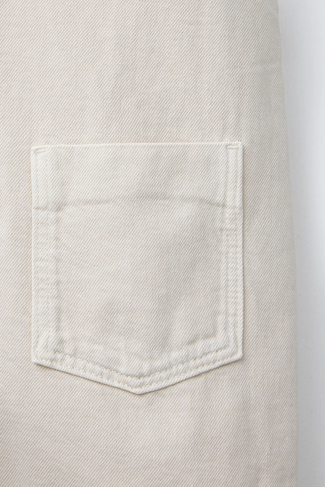 SALOPETTE COURTE EN TOILE CANVAS