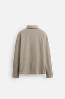 VESTE STRUCTURÉE À CARREAUX