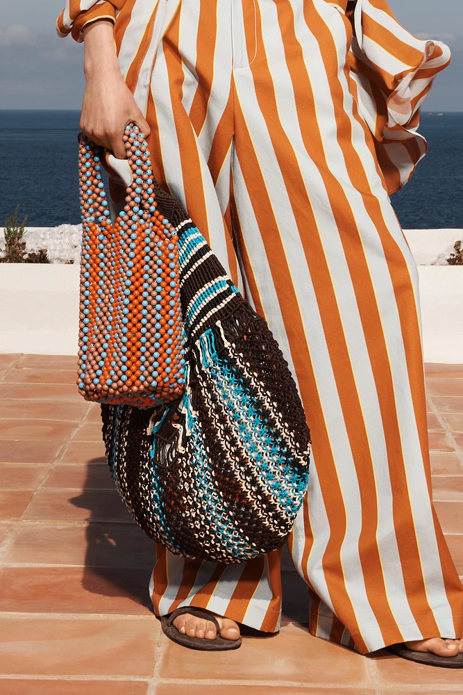 LIMITED EDITION STRIPED WIDE-LEG PANTS