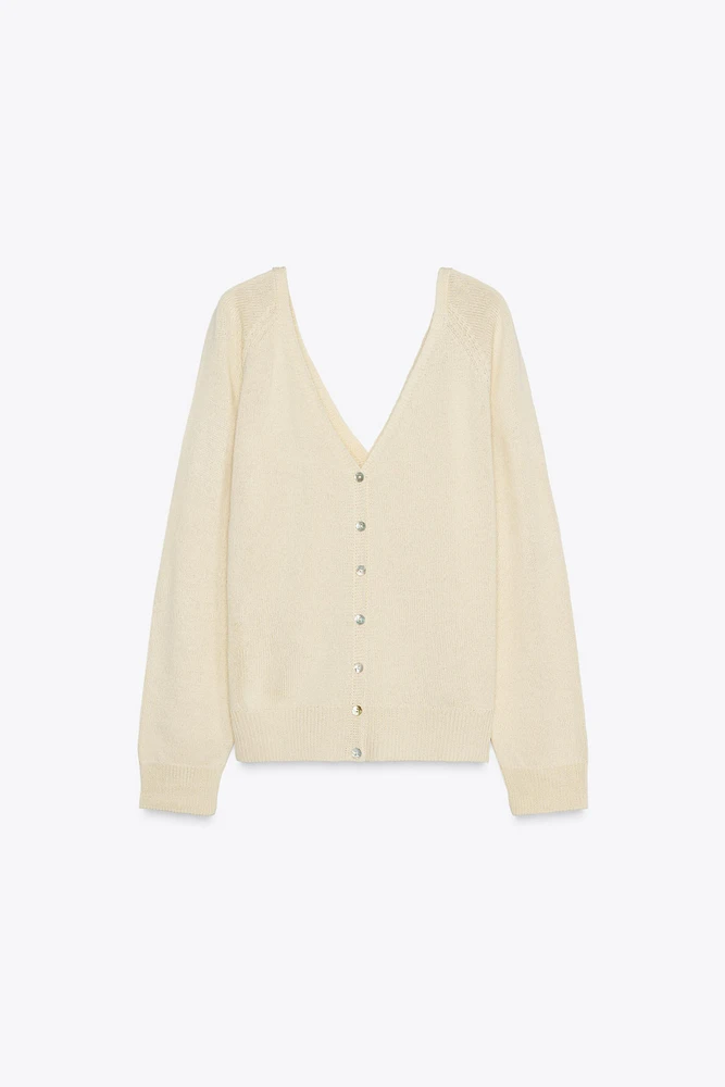 PULL EN MAILLE À BOUTONS