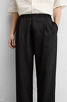 FLOWY PLEATED PANTS