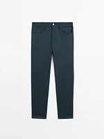 Faux jean tapered fit en coton mélangé