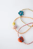 PACK OF THREE CORD BRACELETS WITH CERAMIC