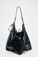 REVERSIBLE SLOUCHY BUCKET BAG