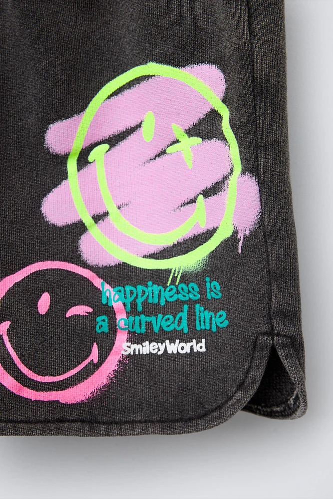 SMILEYWORLD ® WASHED EFFECT PLUSH SHORTS