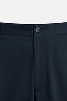PANTALON REGULAR FIT À PLIS