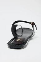ASYMMETRIC LEATHER FLAT SANDALS