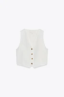 GILET AJOURÉ AU DOS