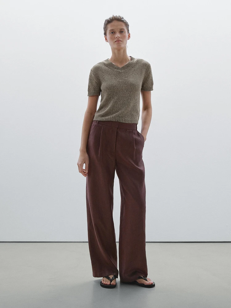 Knit sweater with fabric detail