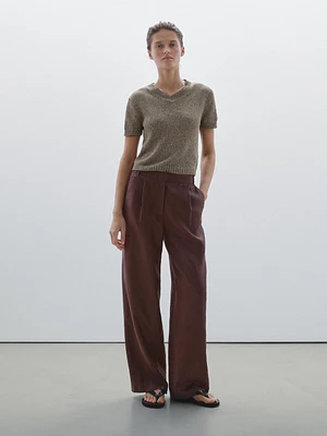Knit sweater with fabric detail