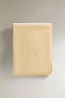 COUVERTURE ENFANT MOTIF RELIEF PEANUTS™