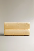 COUVERTURE ENFANT MOTIF RELIEF PEANUTS™