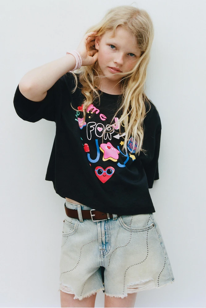 SHORT EN DENIM DÉCHIRÉ ET BRILLANT