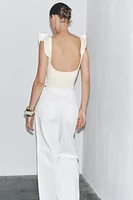 RUFFLED COMBINATION BODYSUIT