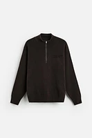 QUARTER ZIP SWEATER