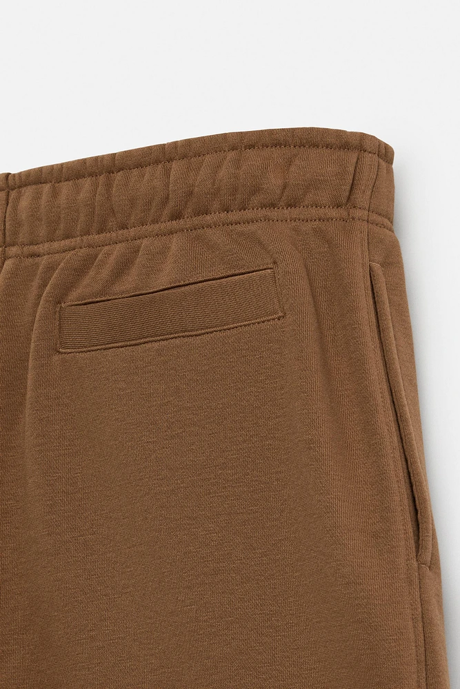 BERMUDA DE JOGGING COUTURES
