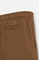 BERMUDA DE JOGGING COUTURES