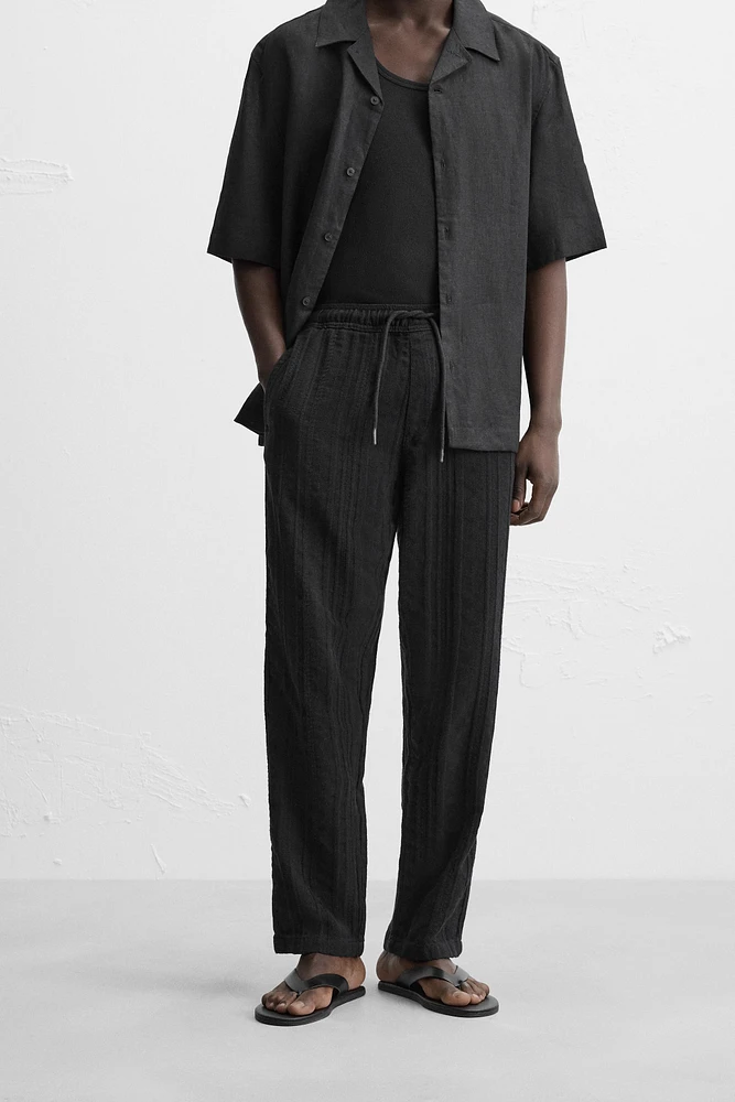 TEXTURED RELAXED FIT PANTS