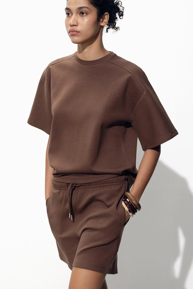 SHORT SLEEVE INTERLOCK SWEATSHIRT