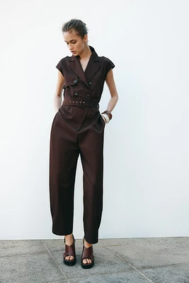 BELTED SLEEVELESS JUMPSUIT