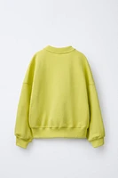 CUT OUT SWEATSHIRT