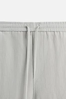 FLOWY WIDE FIT SHORTS