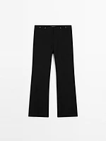 Flared trousers with waist detail