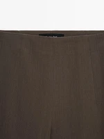 Suit trousers with turn-up hems