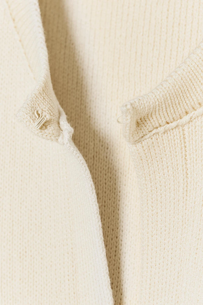 GILET EN MAILLE AVEC POCHES