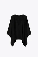 ASYMMETRIC RIBBED CAPE