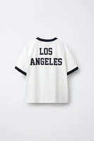 TEXT PRINT T-SHIRT WITH TRIM DETAIL