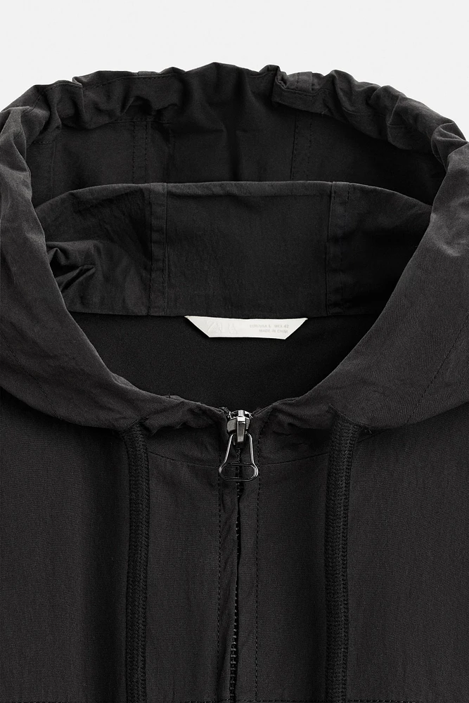 HOODED TECHNICAL JACKET