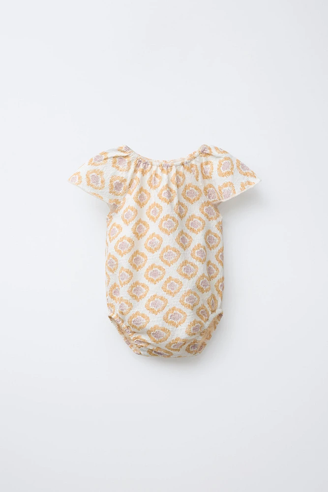 PRINTED BODYSUIT