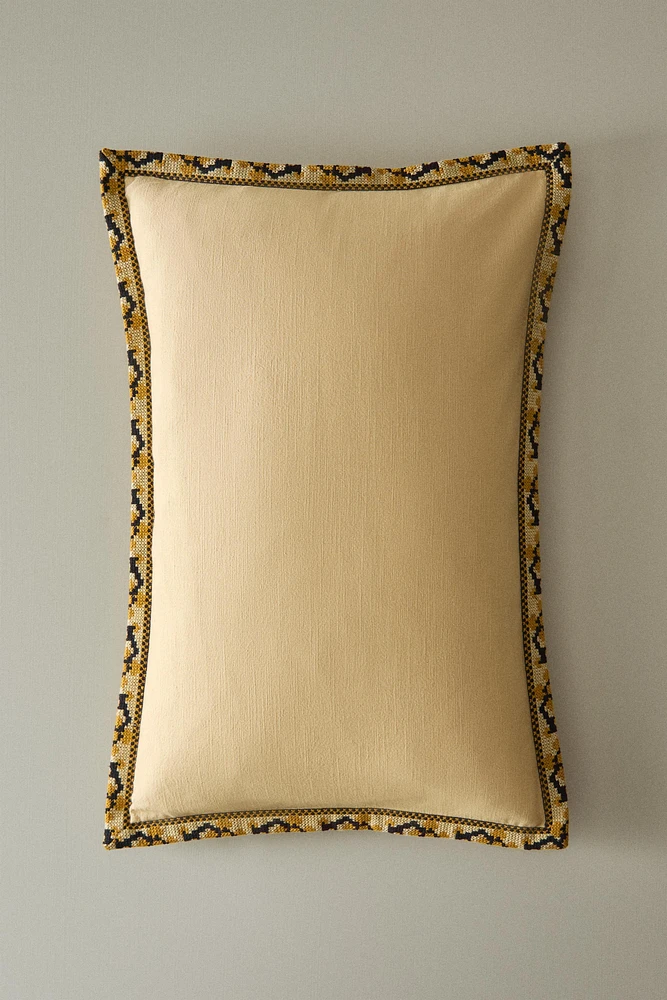 HOUSSE DE COUSSIN BORD GÉOMÉTRIQUE