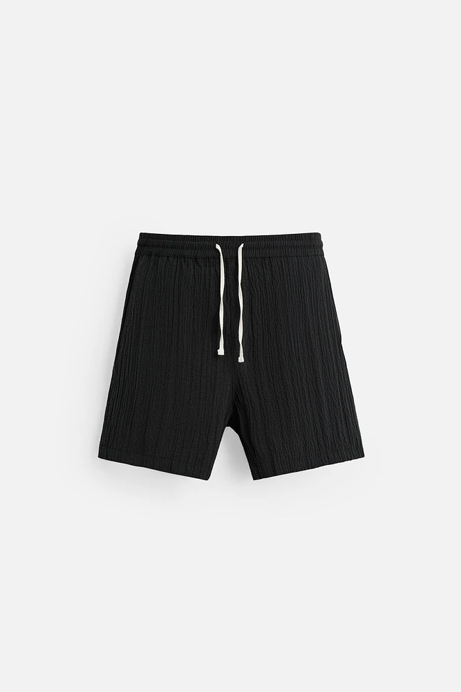 WRINKLED EFFECT JACQUARD BERMUDA SHORTS