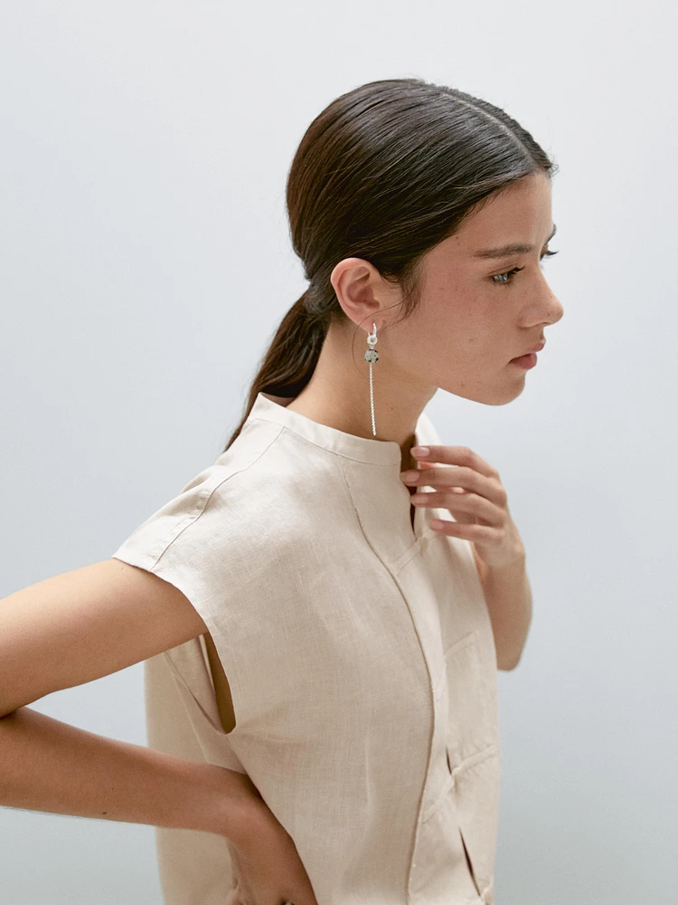 Veste sans manches plastron boutonné