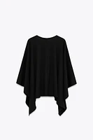 ASYMMETRIC RIBBED CAPE