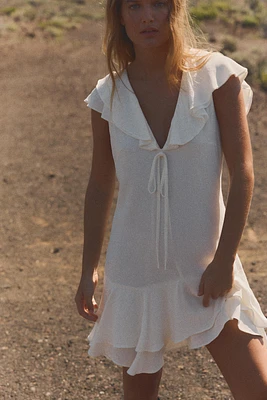 ROBE COURTE À VOLANTS ET NŒUD