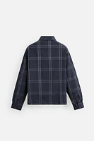 VESTE À CARREAUX ZIPPÉE