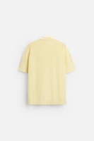 POLO EN MAILLE PERLÉE À ZIP