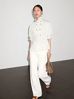 Flowing shirt with button detail on the chest