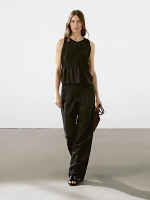Flowing halter top with gathered detail