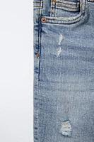 RIPPED SKINNY JEANS