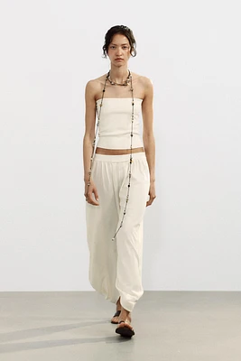 TOP COURT EN MAILLE BANDEAU