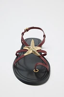STRAPPY SANDALS WITH METALLIC DETAIL