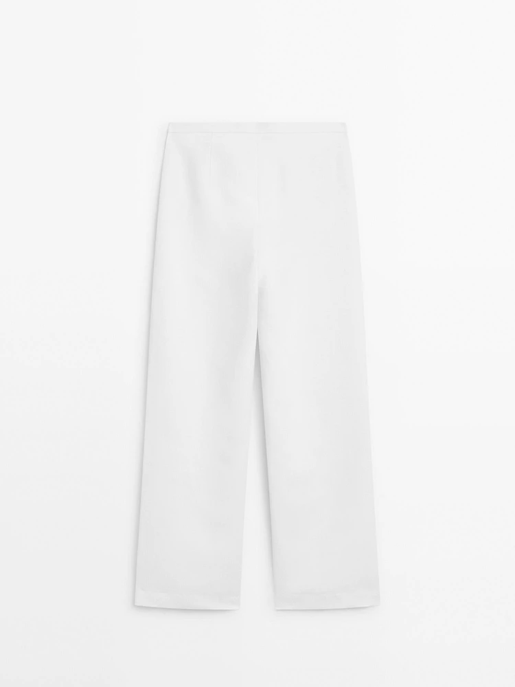 Straight-fit trousers with buckle detail