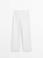 Straight-fit trousers with buckle detail
