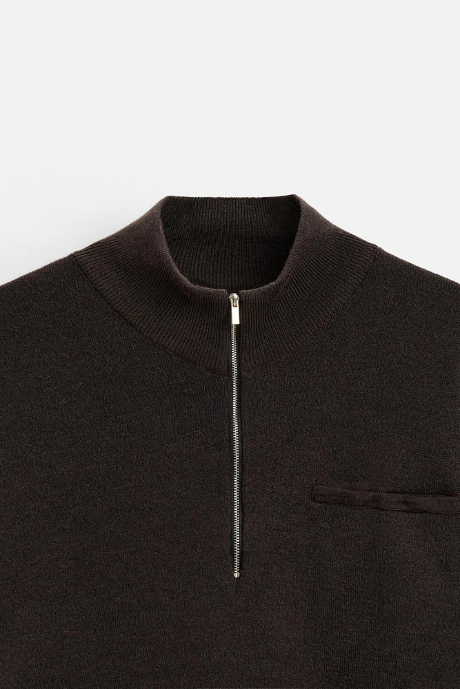 QUARTER ZIP SWEATER