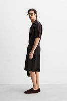 RELAXED FIT PLEATED SHORTS