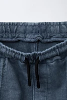WASHED EFFECT ZIP POCKET SHORTS